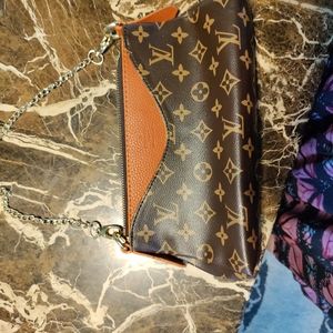 Louis Vuitton clutch